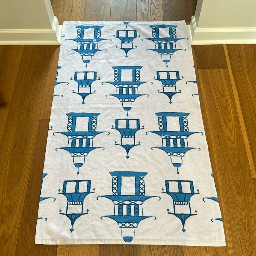 Blue and white beach towel. Used once. Like new.